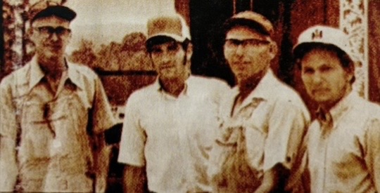 Historic photo of the Sims family framing crew